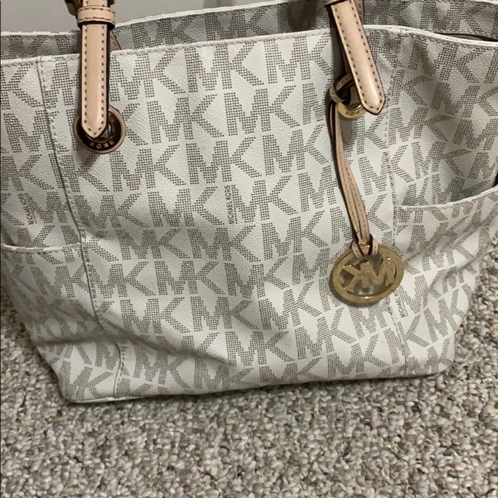 White and Tan Michael Kors purse
